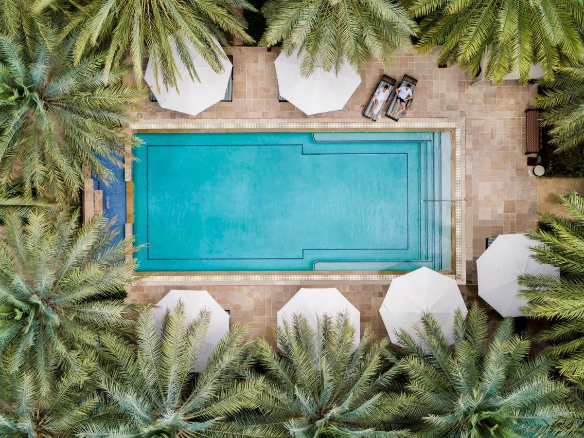 Jumeirah Dar Al Masyaf Dubai Exterior photo Aerial view of the pool at the Four Seasons Hotel