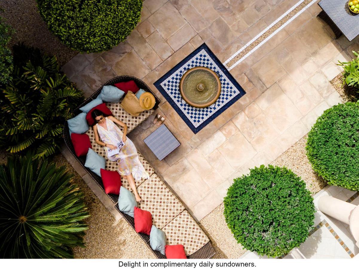 Jumeirah Dar Al Masyaf Dubai Exterior photo The courtyard at the Four Seasons Hotel, Marrakech